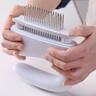 Kép 2/6 - Húspuhító rozsdamentes acél tűkkel (48 tű) fehér