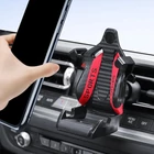 Kép 7/7 - Autós telefontartó szellőzőrácsra, gravitációs, sportülés forma (sárga-fekete)